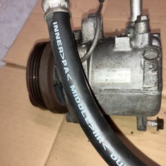MH23S エアコンコンプレッサーの画像