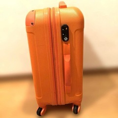 オレンジ キャリーケースの画像