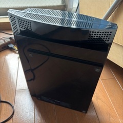 プレイステーション3とソフト3本の画像