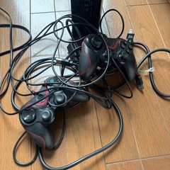 プレイステーション3とソフト3本の画像