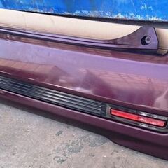 中古パーツ　ダイハツ ムーヴカスタム　 L175S リアバンパー　カラー№Ｒ49 の画像