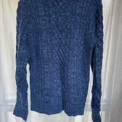 ケーブルニット　セーターの画像
