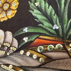 額縁入りインドの布製絵の画像