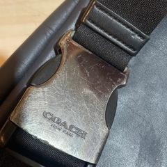 coachシグネイチャーボディバックの画像