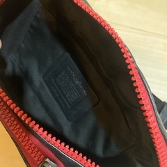 coachシグネイチャーボディバックの画像