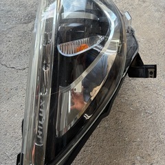 GUN125125ハイラックス　中古ヘッドライト右の画像