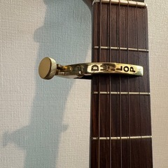 アコギ、カポ、楽譜の画像