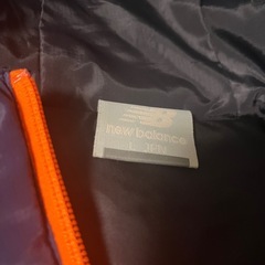 New Balance フード付きナイロンジャケットの画像