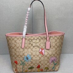 [コーチ] 花柄のプリント 大容量 トートバッグ ショッピングバッグの画像