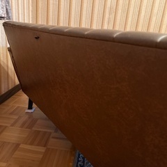 レトロなソファを差し上げます。の画像
