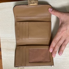coach 三つ折り財布の画像