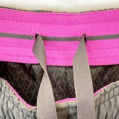 ナイキ ウィンドパンツ 裏メッシュ ウインドブレーカー M グレー ピンク 556132-065 レディース NIKE スポーツウェア ランニング 防寒の画像