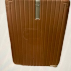 ピンクのキャスター付きスーツケース
の画像