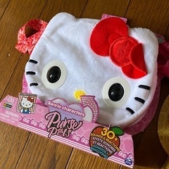 ハローキティ　マイメロディーの音楽が鳴ったり目がパチパチ動くギミックの付いたバック新品2種セットです。の画像