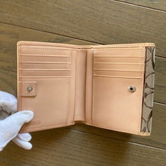 コーチシグネチャー　COACH
折り財布の画像