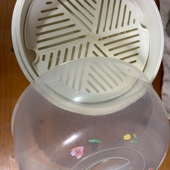 ハートのケーキの型とケーキを入れておく物になります。の画像