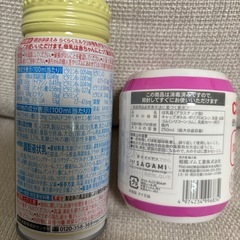 【２点セット】ミルク缶＆使い捨て哺乳ボトルの画像