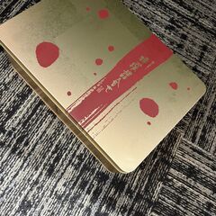 もち吉　お菓子の空き缶の画像