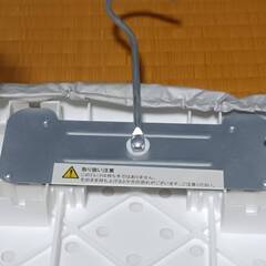 フック付きアイロン台　ニトリの画像