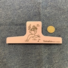 本を開いておくクリップの画像