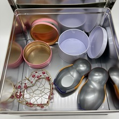 「0円」お菓子の空き缶の画像