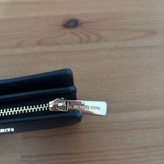 ほとんど使ってないですマイケルコース　二つ折り財布の画像