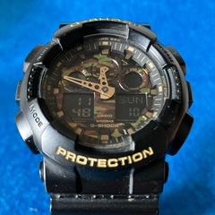 CASIO G-SHOCK GA-100CF文字盤　迷彩　バックライト　オレンジ　早いお取引きの方を優先させて頂きます。
の画像