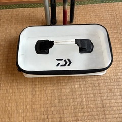 釣竿と小物入れの画像