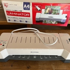 取引中ラミネーターの画像