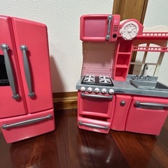 女の子　オモチャの画像