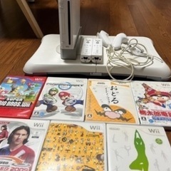 wii本体＋カセット７点（スーパーマリオ、マリオカート、桃鉄、他）の画像