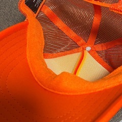 オレンジ　キャップの画像