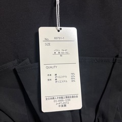 黒い服の画像