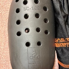 バイク　ひざプロテクター、グローブの画像