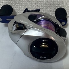 Stefano 両軸リール シルバー 紫スプールの画像