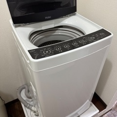ソファーベッド、電子レンジ、洗濯機、冷蔵庫4点セットの画像
