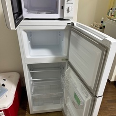 ソファーベッド、電子レンジ、洗濯機、冷蔵庫4点セットの画像