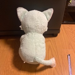 ミニーの財布とぬいぐるみの画像