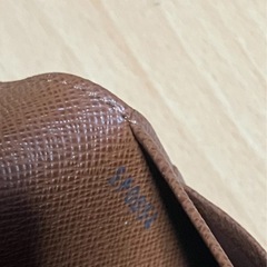 中古　正規品ルイビィトン二つ折り財布　付属品ケース付きの画像