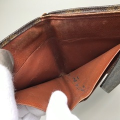 ルイヴィトン モノグラム  Wホック おり財布 男女の画像