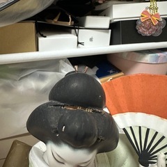 陶器製の日本人形の画像