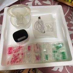 (中古)電動搾乳器　＋(未使用)保存袋　＋母乳パットの画像