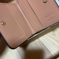 COACH x PEANUTS スヌーピー 二つ折り財布の画像