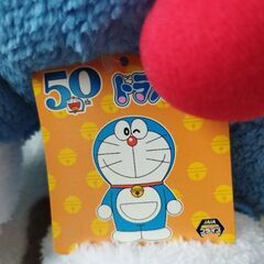 ドラえもんぬいぐるみ(右手に汚れあり、(大きさ約50cm))の画像