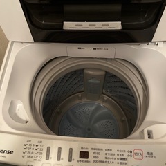ガスコンロ、デロンギ、電子レンジ、食器棚、洗濯機
の画像