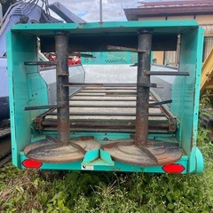 牛の糞の牽引車ですの画像