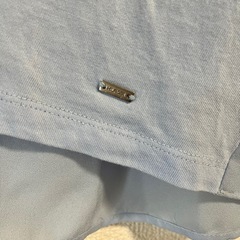 【TOMMYHILFIGER】ライトブルー ブラウス Lサイズ 生地切り替えの画像