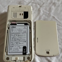 K010携帯本体と電池パックとACコードのセットの画像