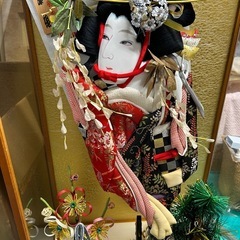 ケース入りの羽子板飾りの画像