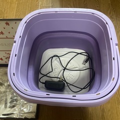 ミニ洗濯機とコーヒースプーンなどの画像